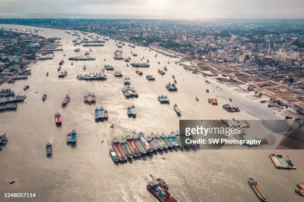 drone photo of cargo ships at chittagong port, chittagong, bangladesh - bangladesh photos et images de collection