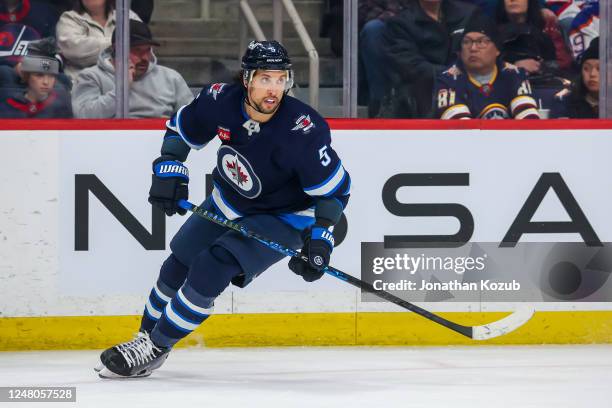 Brenden Dillon of the Winnipeg Jets skates during first period action against the Edmonton Oilers at Canada Life Centre on March 04, 2023 in...