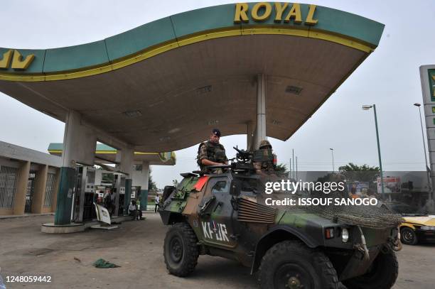 Soldiers of the French Licorne Operation patrol in a district of Abidjan on April 13, 2011. Ivory Coast President Alassane Ouattara said today he...