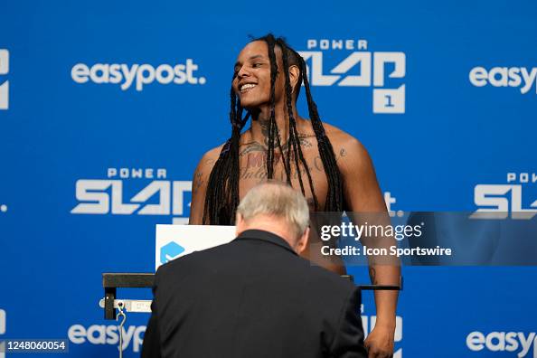 Ayjay Ayjay Hintz steps on the scale for the official weigh-ins at UFC Apex ...