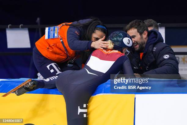 Xandra Velzeboer of the Netherlands reacts with coach Niels Kerstholt of the Netherlands after competing on the Women's 1000m during the ISU World...