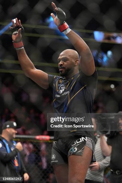 Jon Jones celebrates his victory over Ciryl Gane in their Heavyweight fight during the UFC 285 event at T-Mobile Arena on March 4, 2023 in Las Vegas,...