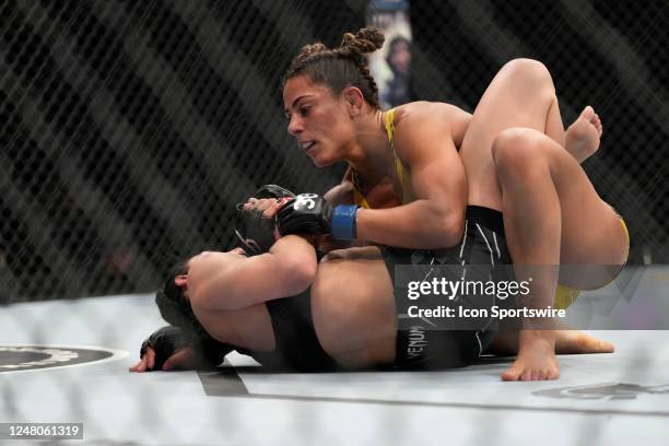 Tabatha Ricci controls the body of Jessica Penne in their Women's Strawweight fight during the UFC 285 event at T-Mobile Arena on March 4, 2023 in...