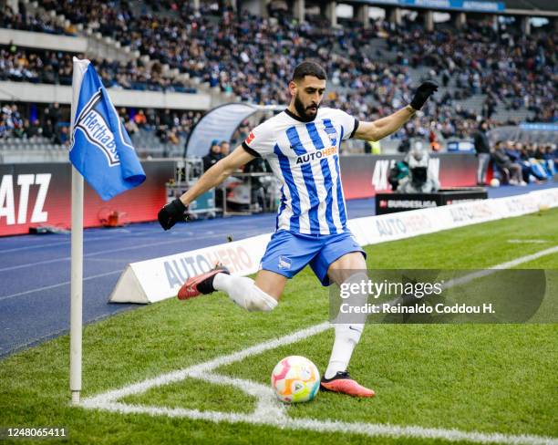 Tolga Cigerci of Hertha BSC takes a corner kick during the Bundesliga match between Hertha BSC and 1. FSV Mainz 05 at Olympiastadion on March 11,...