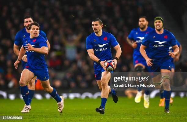 England , United Kingdom - 11 March 2023; Thomas Ramos, centre, and Antoine Dupont of France during the Guinness Six Nations Rugby Championship match...