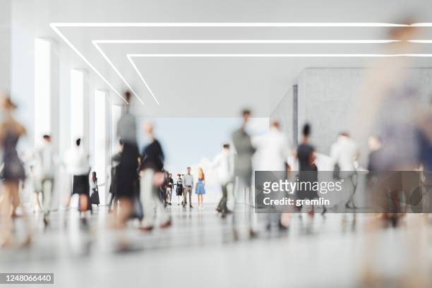 defocused people in the office - crowd of people walking stock pictures, royalty-free photos & images