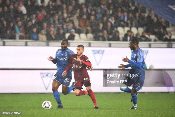 Jordy GASPAR - 12 Kevin TESTUD - 06 Franck BAMBOCK during the Ligue 2 BKT match between Grenoble and Annecy at Stade des Alpes on March 11, 2023 in...