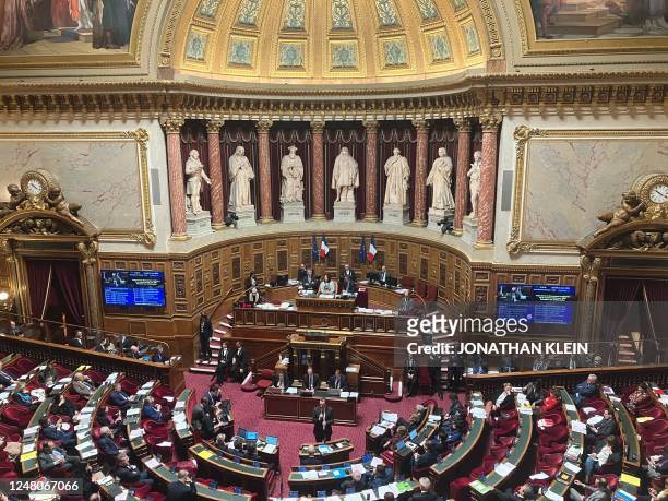 Senators attend a session on the government's pension reform at the French Senate in Paris on March 11, 2023. - France's Senate, the upper chamber of...