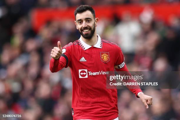 Manchester United's Portuguese midfielder Bruno Fernandes gestures during the English Premier League football match between Manchester United and...