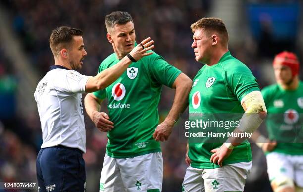Scotland , United Kingdom - 12 March 2023; Jonathan Sexton, centre, and Tadhg Furlong of Ireland remonstrate with referee Luke Pearce after having a...