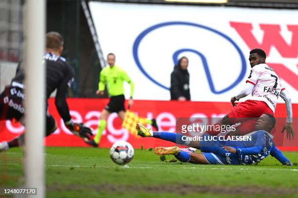 Essevee's Alieu Fadera and Gent's Mathias Nurio Fortuna fight for the ball during a soccer match between SV Zulte Waregem and KAA Gent, Sunday 12...