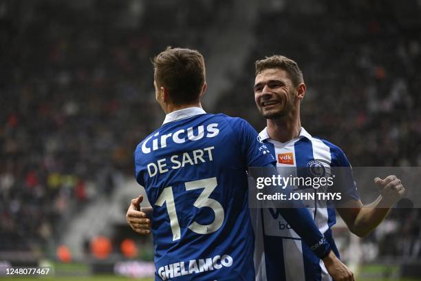 Gent's Julien De Sart and Gent's Hugo Cuypers celebrate after scoring during a soccer match between SV Zulte Waregem and KAA Gent, Sunday 12 March...