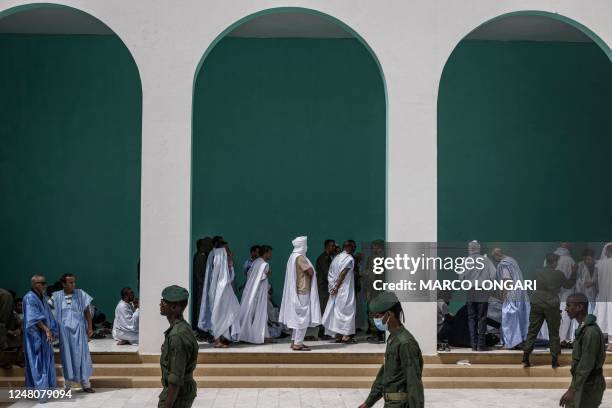 Members of Mauritanian Police gather during the funeral of Mauritanian police officer Mustapha Ould El Khadir Ould Abeid at the Ibn Abbas Mosque in...