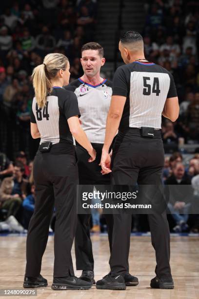 Ray Acosta, Jenna Schroeder and Ben Taylor looks on during the game on February 24, 2023 at Target Center in Minneapolis, Minnesota. NOTE TO USER:...