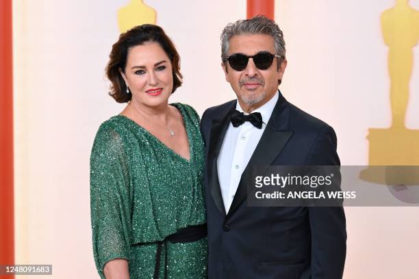 Argentine actor Ricardo Darin and his wife Florencia Bas attend the 95th Annual Academy Awards at the Dolby Theatre in Hollywood, California on March...