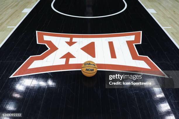 View of the Big 12 logo and an NCAA basketball on the floor before Big 12 Tournament semifinal basketball game between the Iowa State Cyclones and...
