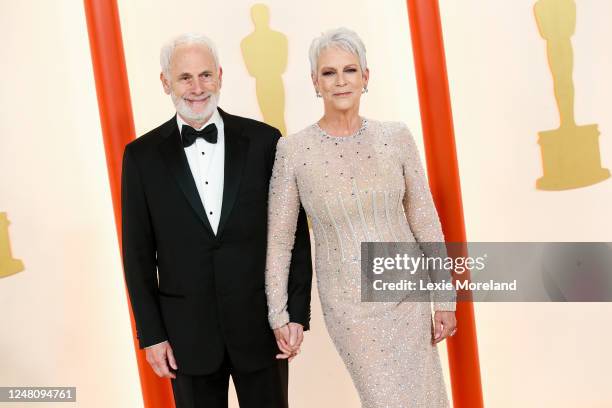 Jamie Lee Curtis and her husband Christopher Guest at the 95th Annual Academy Awards held at Ovation Hollywood on March 12, 2023 in Los Angeles,...