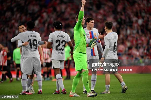 Barcelona's German goalkeeper Marc-Andre ter Stegen celebrates victory at the end of the Spanish league football match between Athletic Club Bilbao...