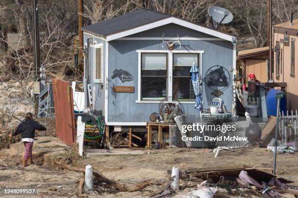 Damaged trailer homes are seen in the aftermath of a flood caused by rain-melted snow that raised level of the Kern River from about six feet to 17...