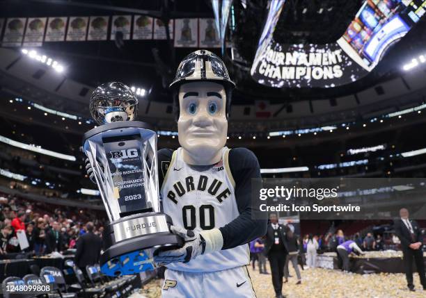 Purdue Boilermakers mascot Pete poses with the Big Ten Conference Men's Basketball Tournament trophy after the Big Ten Conference Men's Basketball...