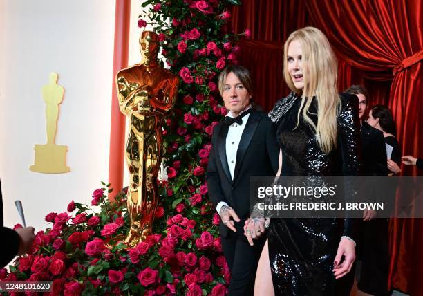 Australian-US musician Keith Urban and his wife US-Australian actress Nicole Kidman attend the 95th Annual Academy Awards at the Dolby Theatre in...