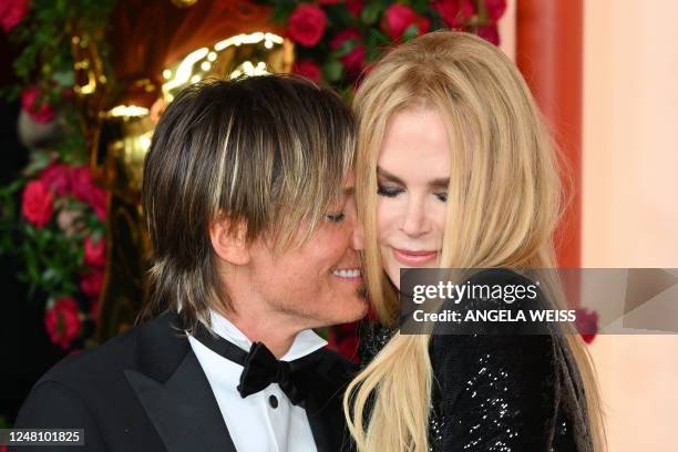 Australian-US musician Keith Urban and his wife US-Australian actress Nicole Kidman attend the 95th Annual Academy Awards at the Dolby Theatre in...