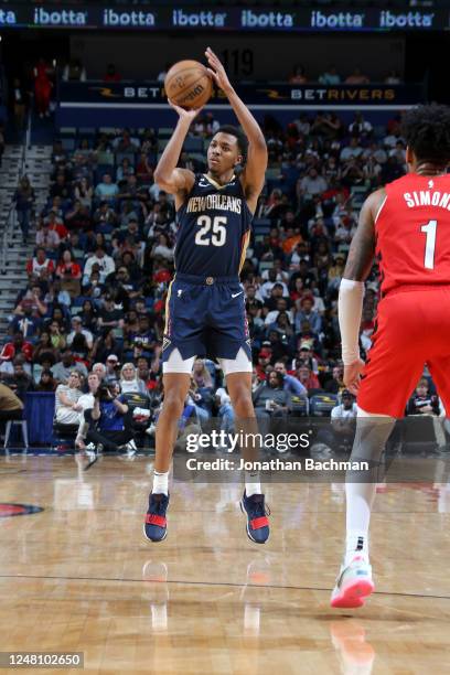 Trey Murphy III of the New Orleans Pelicans shoots a three point basket during the game against the Portland Trail Blazers on March 12, 2023 at the...