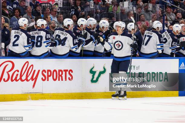 Morgan Barron of the Winnipeg Jets celebrates a goal against the Tampa Bay Lightning during the second period at Amalie Arena on March 12, 2023 in...