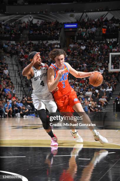 Josh Giddey of the Oklahoma City Thunder drives to the basket during the game against the San Antonio Spurs on March 12, 2023 at the AT&T Center in...