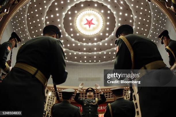 Members of the Chinese People's Liberation Army band perform ahead of the closing session of the First Session of the 14th National People's Congress...