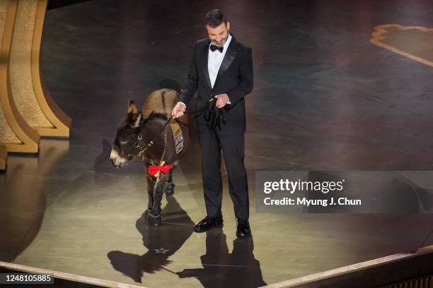 Host Jimmy Kimmel appears onstage with a donkey at the 95th Academy Awards in the Dolby Theatre on March 12, 2023 in Hollywood, California.