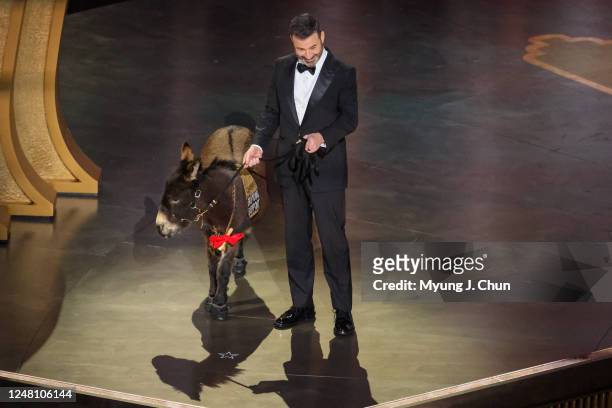 Host Jimmy Kimmel appears onstage with a donkey at the 95th Academy Awards in the Dolby Theatre on March 12, 2023 in Hollywood, California.