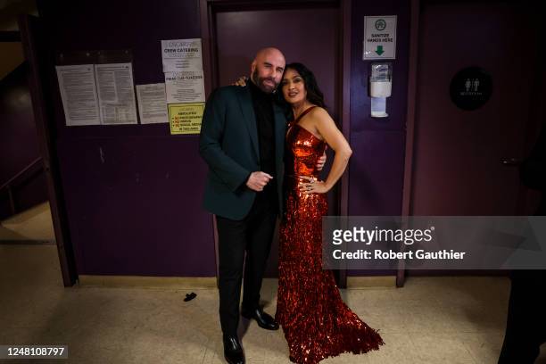 John Travolta, and Salma Hayek, backstage at the 95th Academy Awards at the Dolby Theatre on March 12, 2023 in Hollywood, California.
