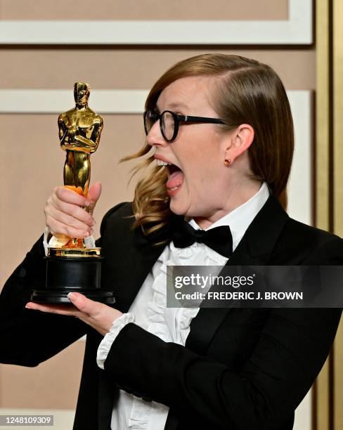 Canadian filmmaker Sarah Polley poses with the Oscar for Best Adapted Screenplay for "Women Talking" in the press room during the 95th Annual Academy...