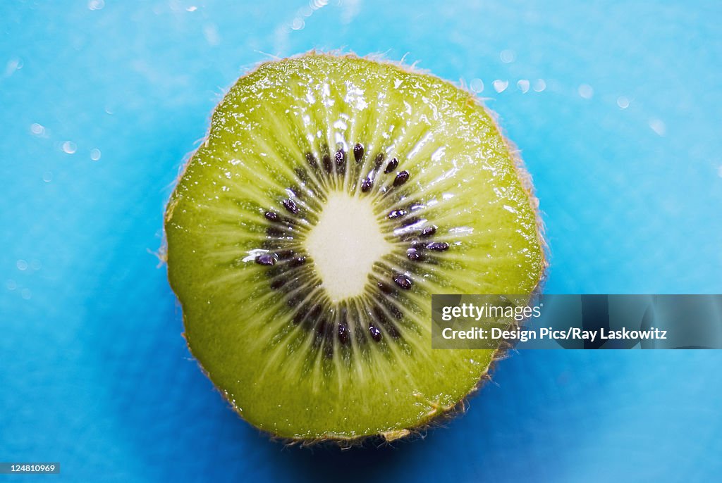 Close-up of a kiwi cut in half.