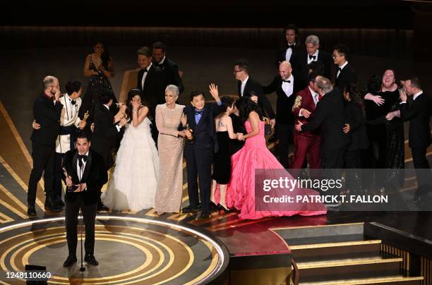 Film producer Jonathan Wang accepts the Oscar for Best Picture for "Everything Everywhere All at Once" onstage during the 95th Annual Academy Awards...