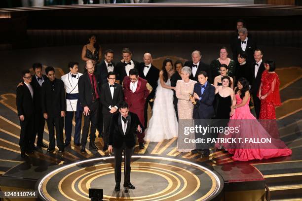 Film producer Jonathan Wang accepts the Oscar for Best Picture for "Everything Everywhere All at Once" onstage during the 95th Annual Academy Awards...