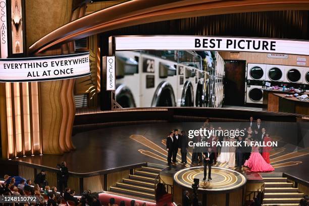 Film producer Jonathan Wang accepts the Oscar for Best Picture for "Everything Everywhere All at Once" onstage during the 95th Annual Academy Awards...