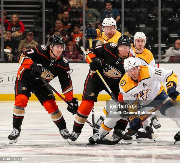 Anaheim Ducks and Nashville Predators battle for position during the second period at Honda Center on March 12, 2023 in Anaheim, California.