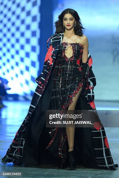 Bollywood actress Ananya Panday presents a creation by designer Manish Malhotra during the Lakmé Fashion Week x FDCI, in Mumbai on March 12, 2023. /...