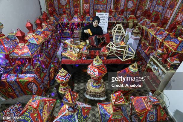 Palestinian Reham Shurab prepares "Ramadan Lanterns" of various colors, patterns and sizes ahead of holy Islamic fasting month of Ramadan in Khan...