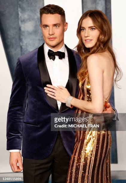 Actress Allison Williams and German actor Alexander Dreymon attend the Vanity Fair 95th Oscars Party at the The Wallis Annenberg Center for the...