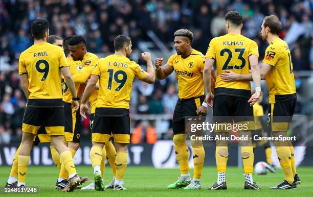 Wolverhampton Wanderers players encourage each other before the Premier League match between Newcastle United and Wolverhampton Wanderers at St....