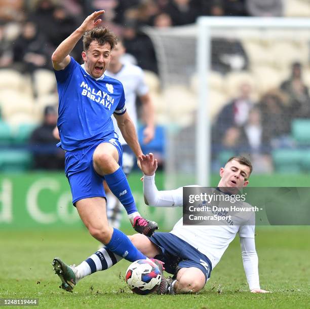 Preston North End's Ben Woodburn battles with Cardiff City's Ryan Wintle during the Sky Bet Championship between Preston North End and Cardiff City...