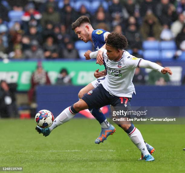 Bolton Wanderers' Shola Shoretire holds off the challenge from Ipswich Town's George Hirst during the Sky Bet League One between Bolton Wanderers and...