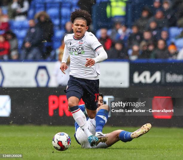 Bolton Wanderers' Shola Shoretire is fouled by Ipswich Town's Massimo Luongo during the Sky Bet League One between Bolton Wanderers and Ipswich Town...