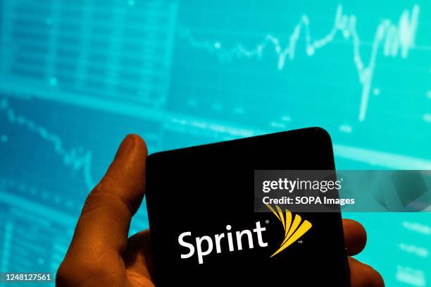 In this photo illustration, the American telecommunications company provides wireless services internet service provider Sprint logo is seen...
