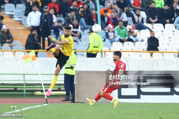 Ramin Rezaeian of Sepahan S.C. Controls the ball during the Persian Gulf Pro League match between Persepolis and Sepahan S.C on March 11, 2023 in...