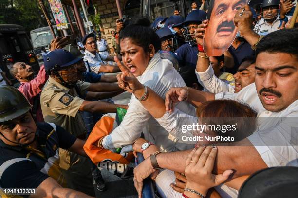 Activists of India's main opposition Congress party shout slogans during a demonstration to protest against the Indian government's financial...