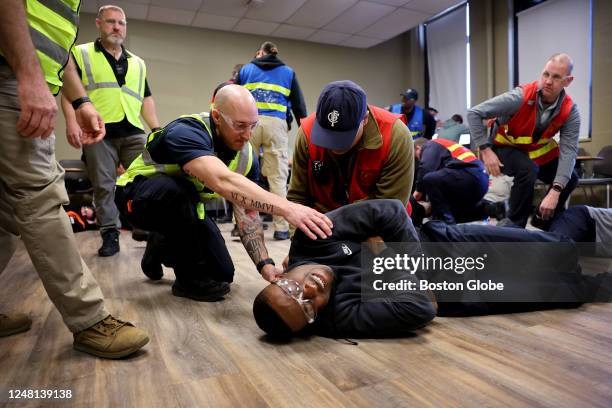 Andover, MA First responders tend to victims of a mass shooting during an Active Shooter / Hostile Event Response Program training exercise in...